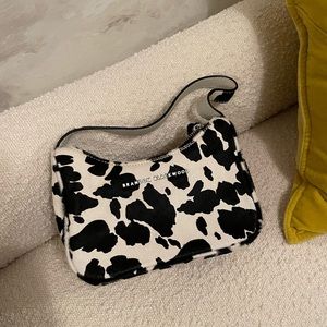 Brandon Blackwood Cow Print Mini Purse brand new